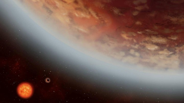 Recreación del planeta K2-18b, situado en la zona habitable de su estrella: no está demasiado lejos ni muy cerca de su fuente de calor.