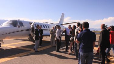 Por primera vez Gioja viajó en avión desde su regreso