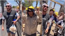 Gaseosas, sanguchitos y música: Omega sorprendió a obreros de una construcción