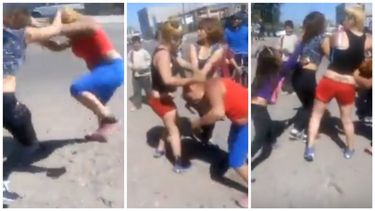 Dos mujeres envueltas en una feroz trifulca; la hijita de una llora, y también pelea